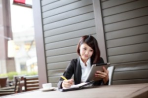 575 Madison Avenue Woman with IPAD